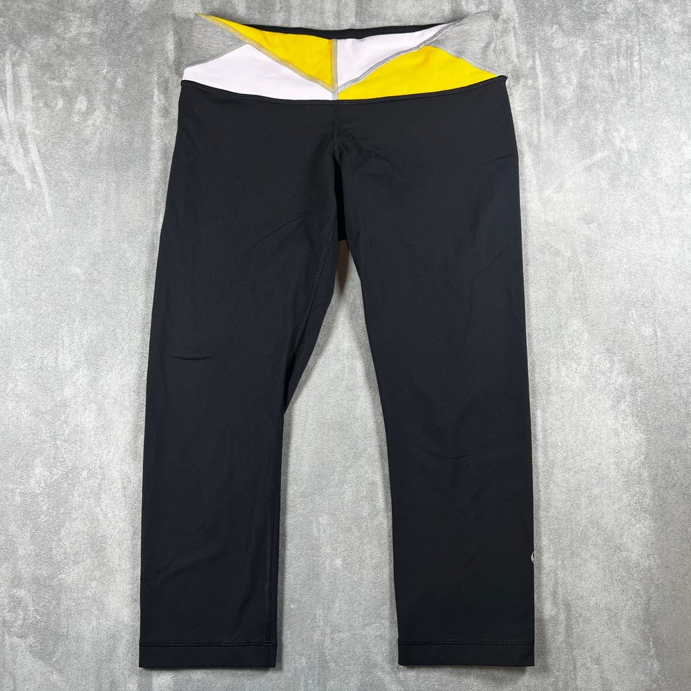 Lululemon Black Cropped Yoga Womens 6 Leggings Reversable Waistband Yellow